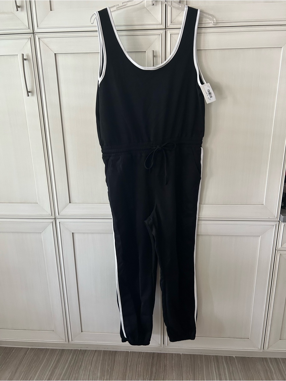 white birch Black Sleeveless Jumpsuit with White Side Stripes and Trim